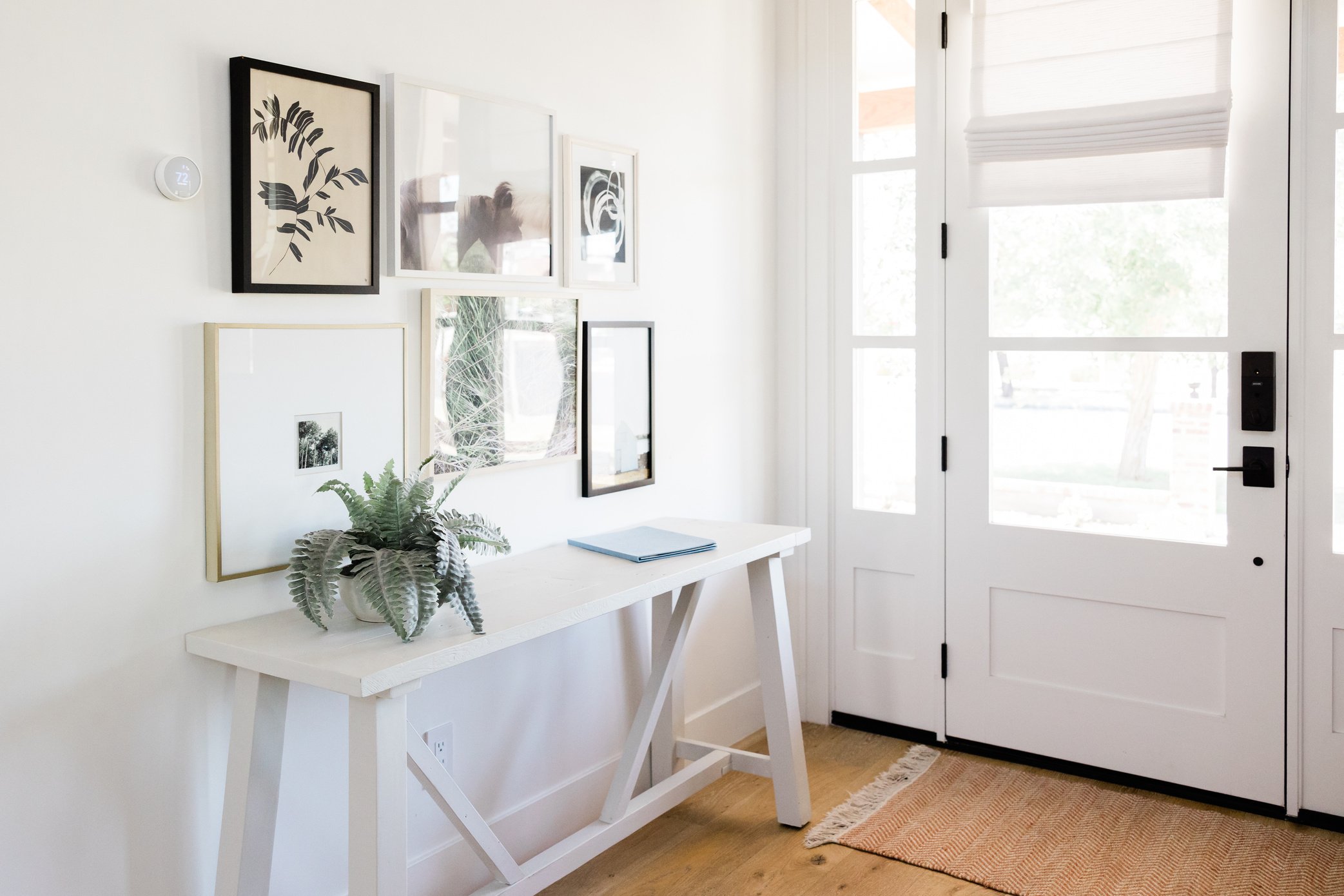 Paintings Hanging above the Wooden Table